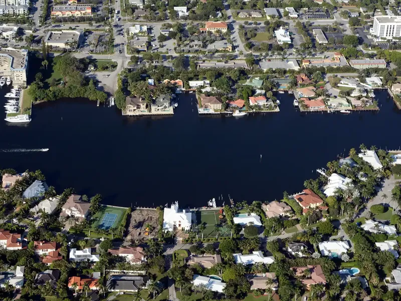 Aerial view of waterfront homes with private docks in the 900 block of Seagate, Delray Beach, Florida
